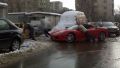 Ferrari is being towed by Daewoo Tico... only in Romania!